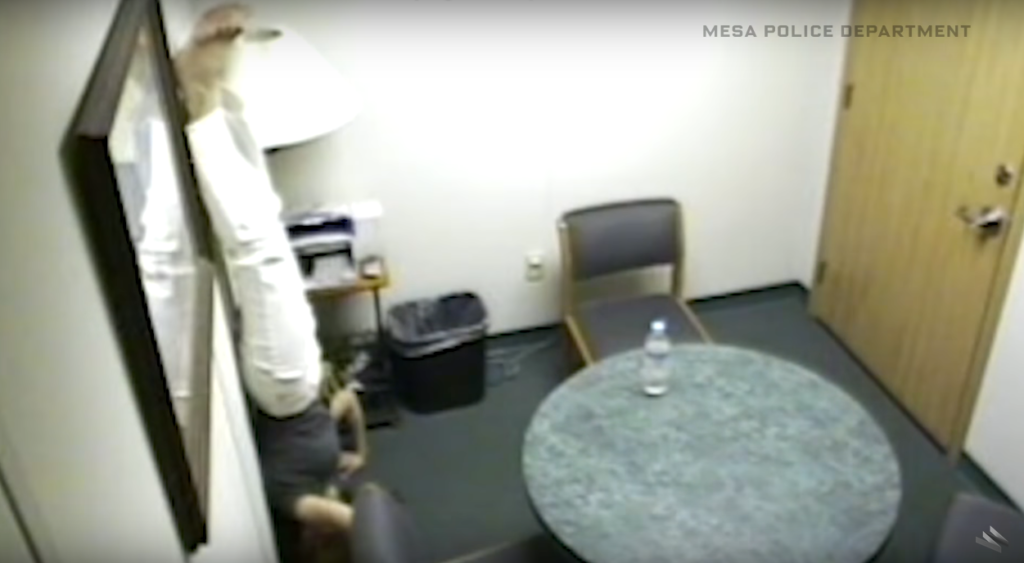 A girl doing a handstand during an investigation