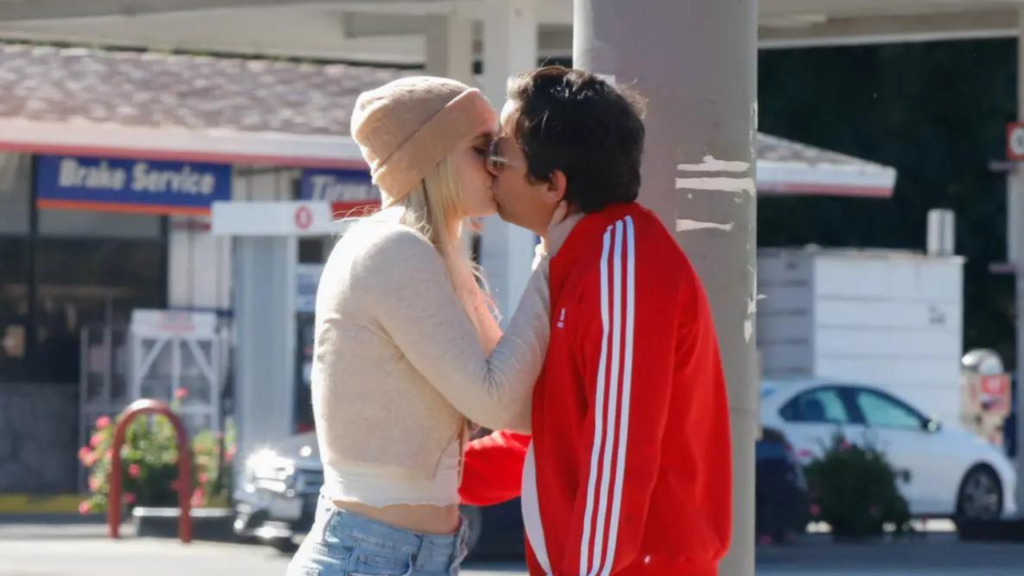 Maggie Sajak was photographed sharing a kiss with Ross McCall